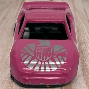 Pink Diecast Toy Car with Silver Eagle Decal & Open Windows 1:64